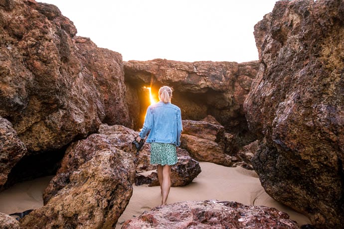 Image of Rosie walking through the smaller cave