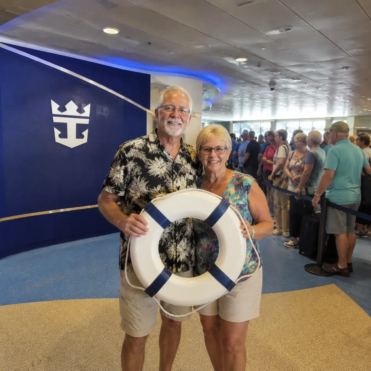 Realistic editorial photo of cruise terminal boarding lanes with rolling suitcases and passengers waiting near check-in