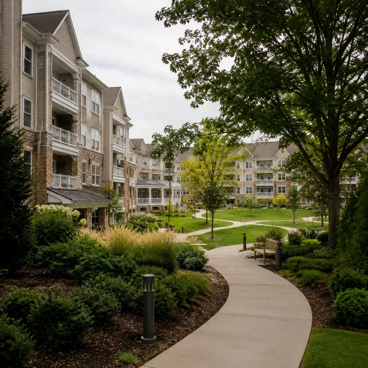 Realistic editorial photo of a North Jersey continuing care retirement campus with senior apartment buildings, trees, wa