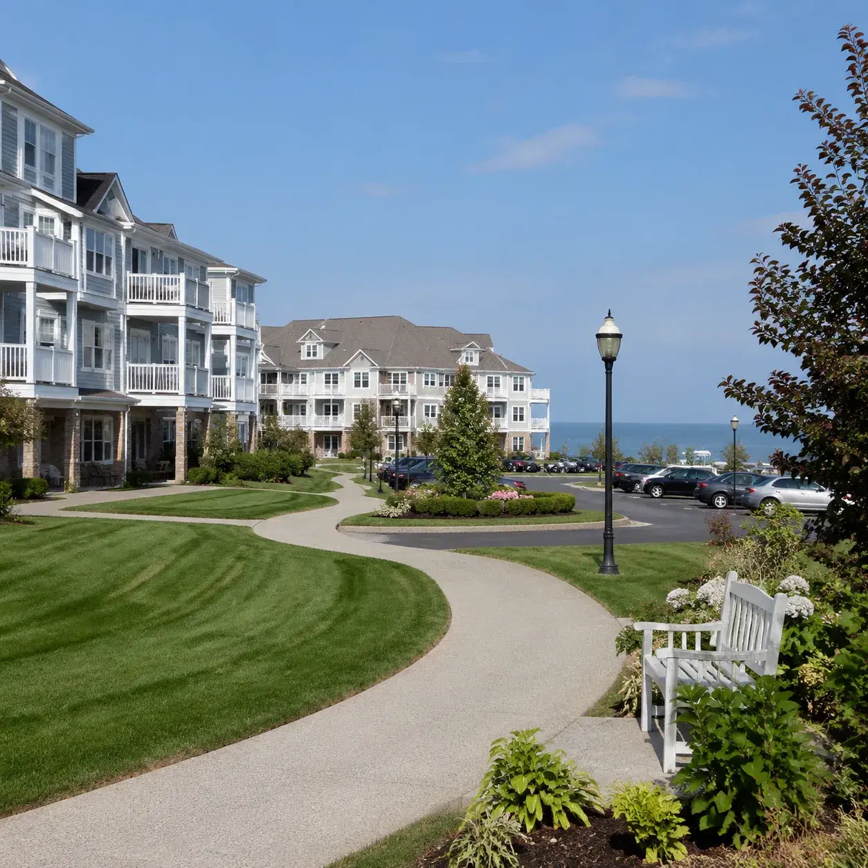 Realistic editorial photo of a Monmouth County continuing care retirement campus with apartment buildings, landscaped pa