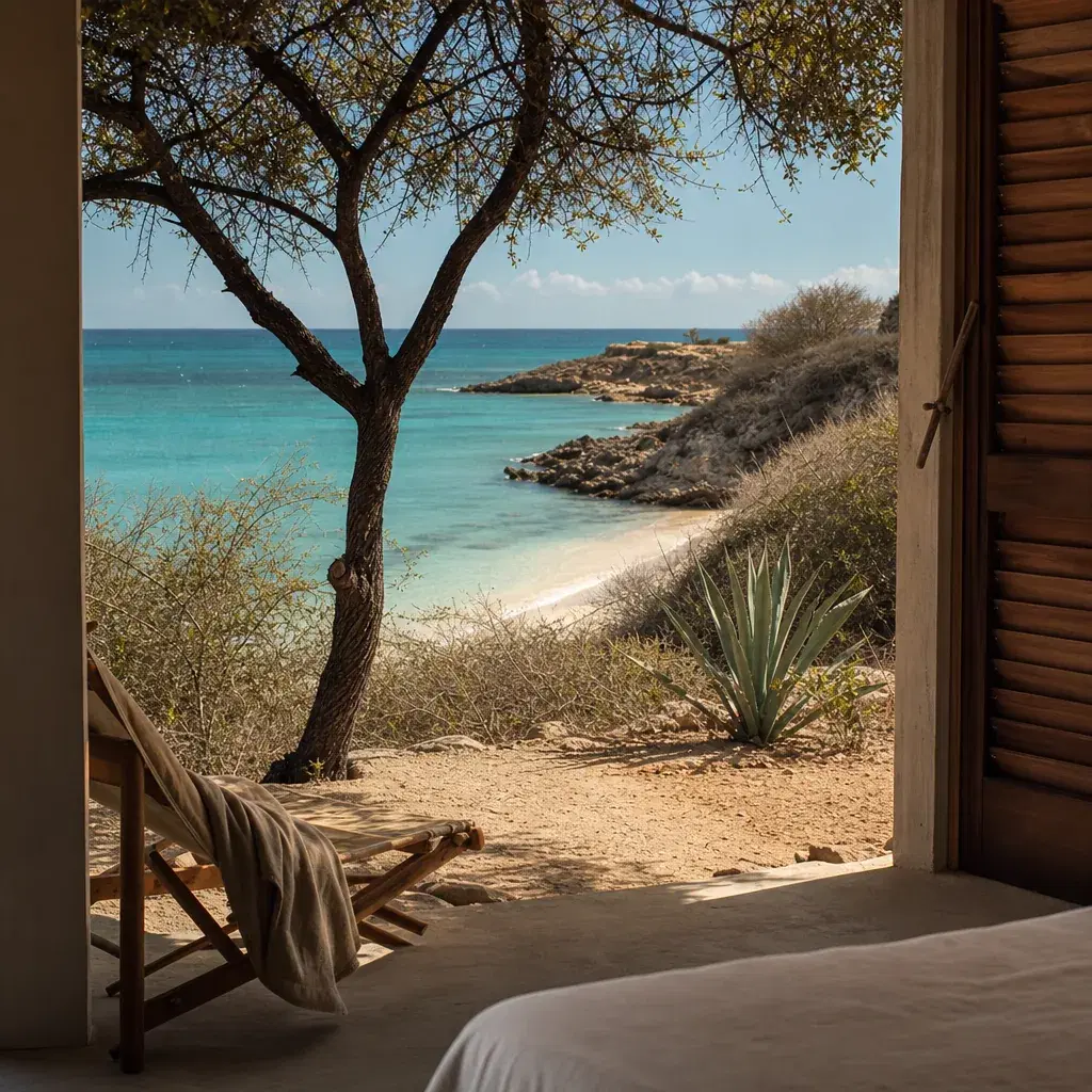 Realistic editorial photo of Aruba beach scene showing a room with little beach access, dry island light and turquoise w