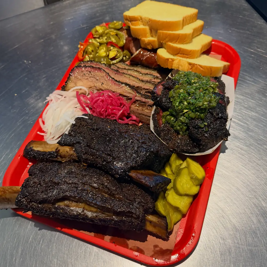 Cattleack Barbeque barbecue food, photo credited to @cattleackbbq on Instagram.