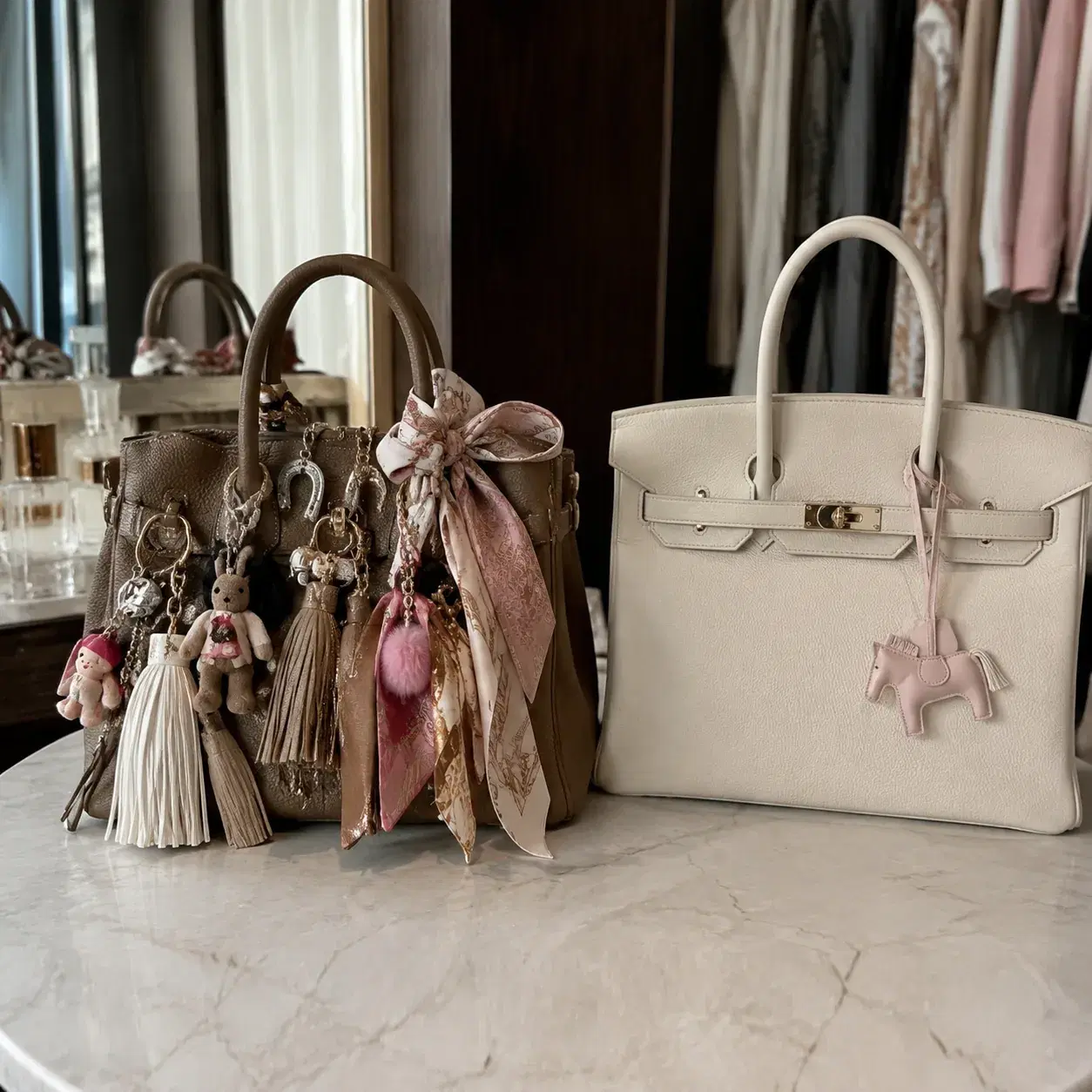 Realistic editorial photo of a handbag covered with multiple charms, tassels, scarves, and keychains beside a cleaner ha