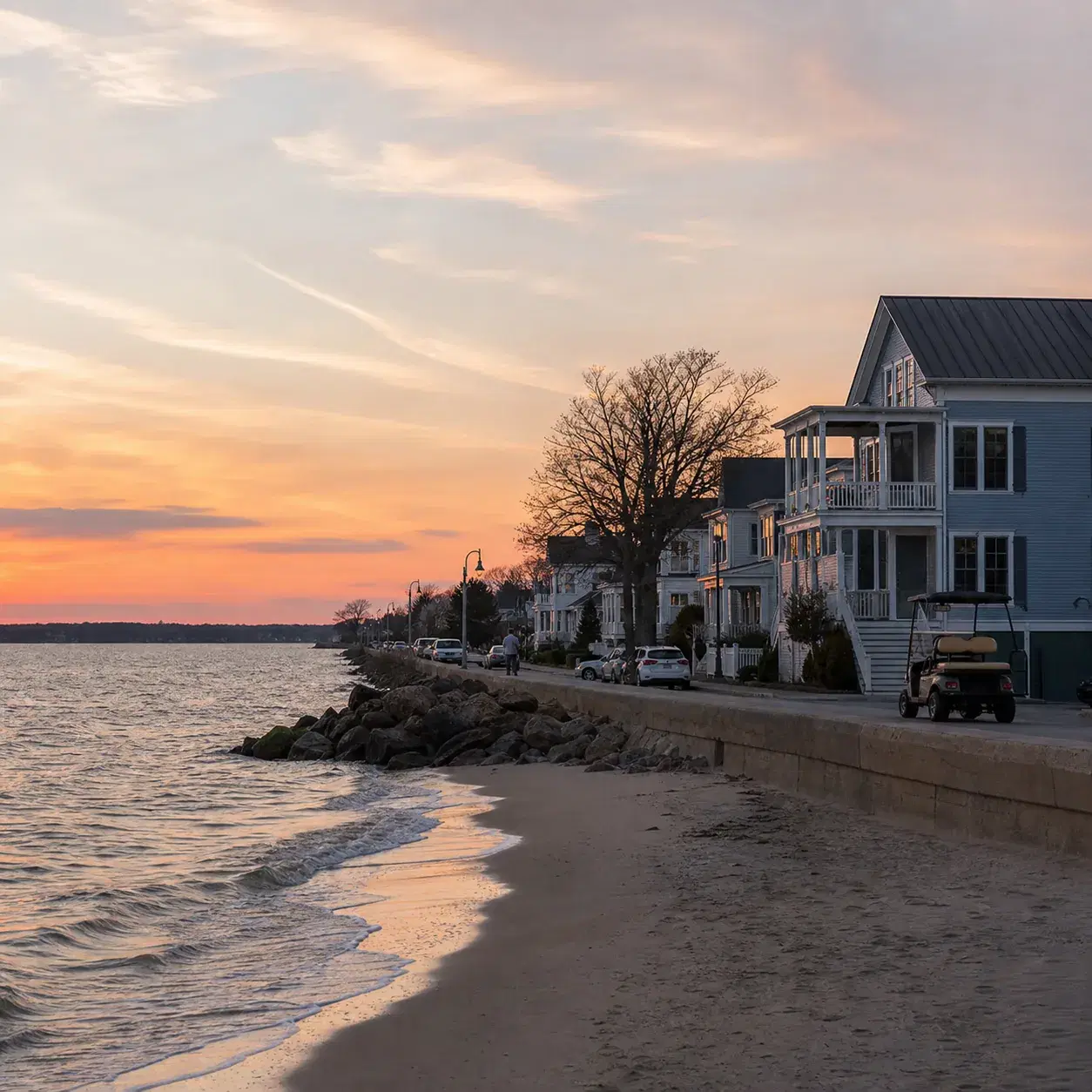 Realistic editorial photo of Cape Charles Virginia with quiet Chesapeake Bay beach, small-town main street, golf cart, a