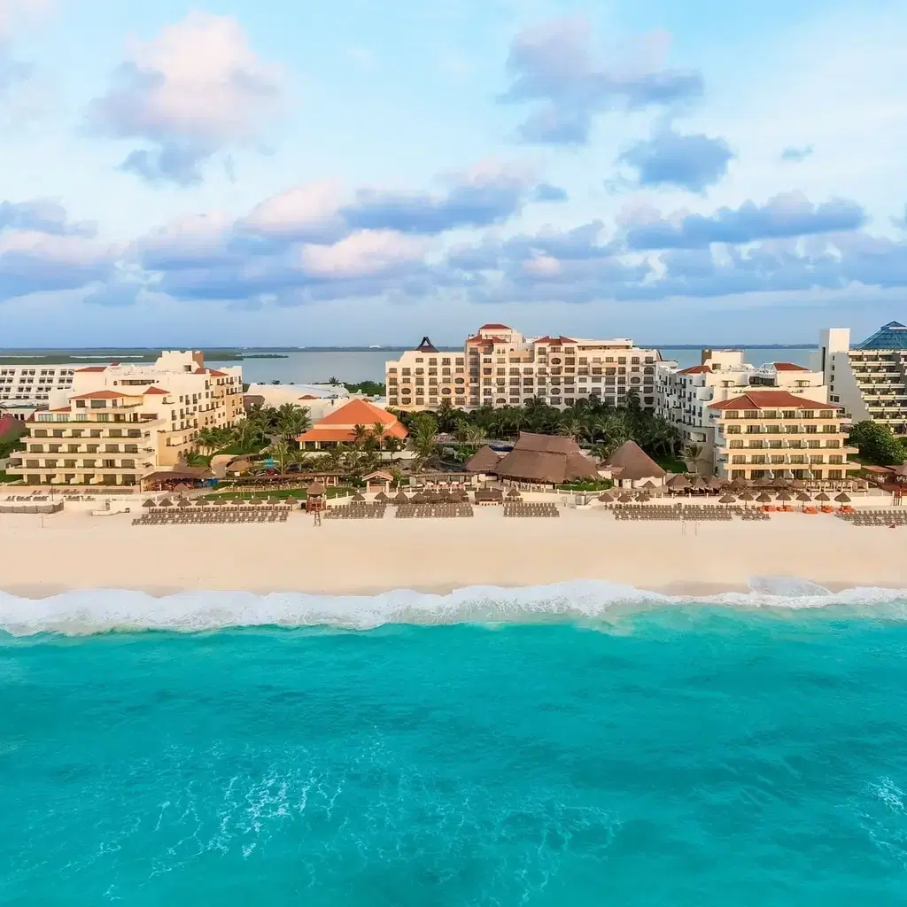 Fiesta Americana Condesa Cancun beside its pool and beach