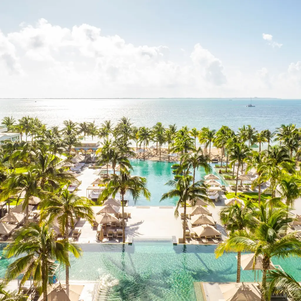 Garza Blanca Cancun overlooking its pools and Caribbean beachfront
