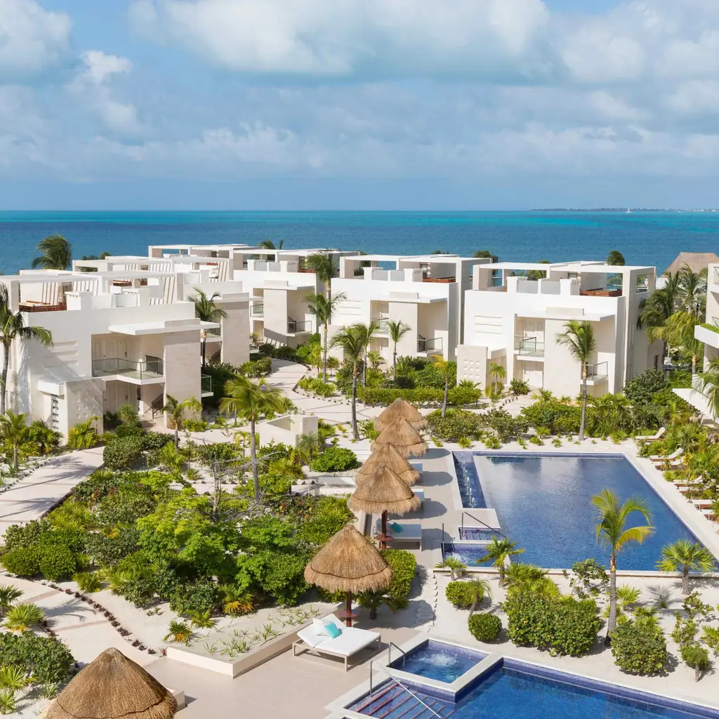 The quiet pool and low-rise resort at Beloved Playa Mujeres