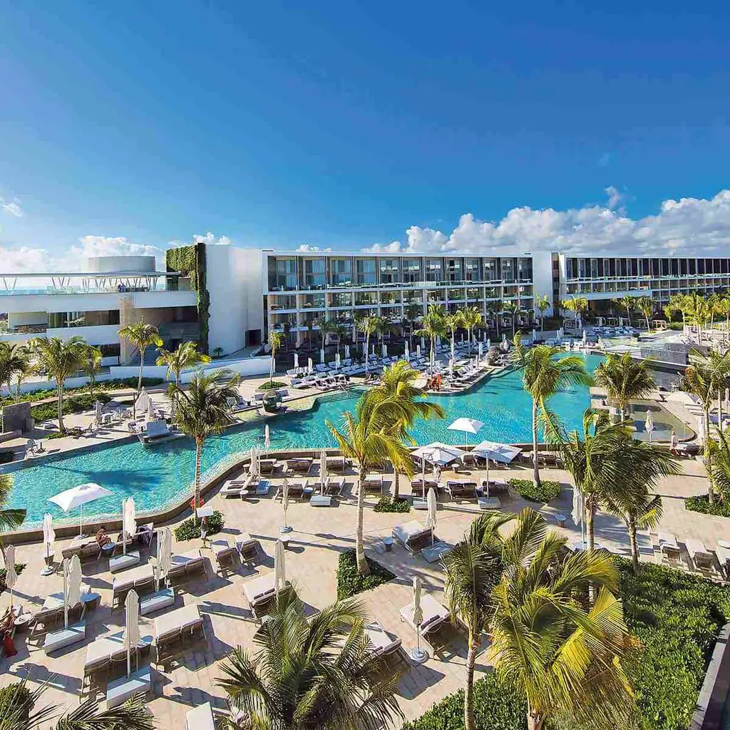 TRS Coral Hotel pool and resort buildings in Costa Mujeres