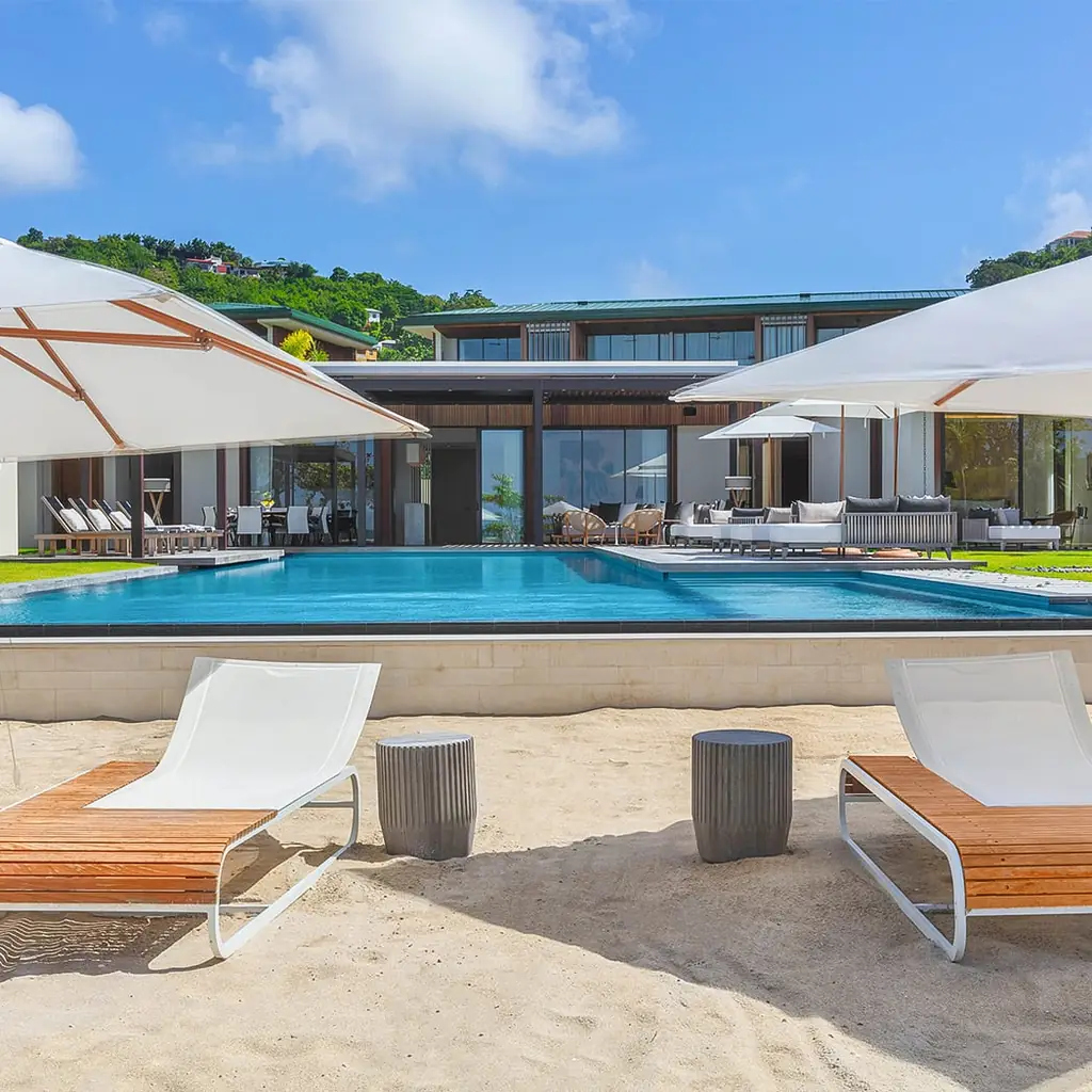 Beachfront pool and modern villas at Silversands Grand Anse in Grenada