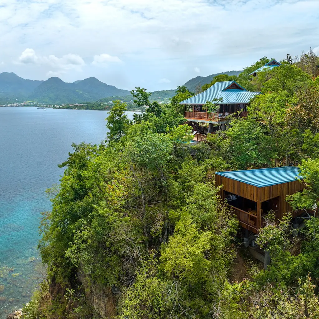 Secret Bay villas tucked into the rainforest above the coast in Dominica