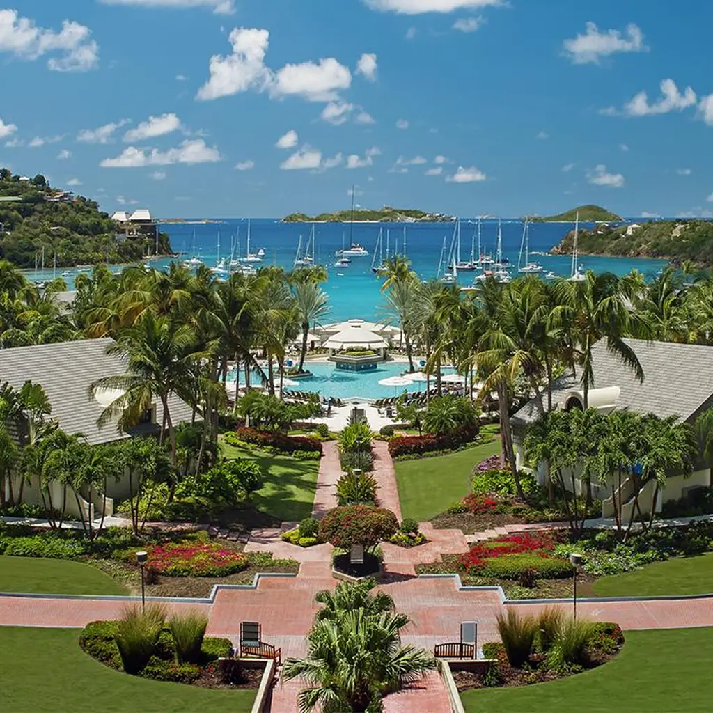 Pool, palms, and harbor view at The Westin St. John Resort Villas