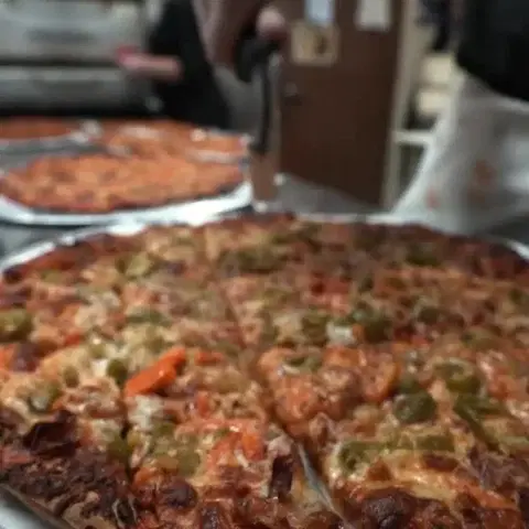 Vito & Nick's, photo credited to @chicagopizzatours on Instagram.
