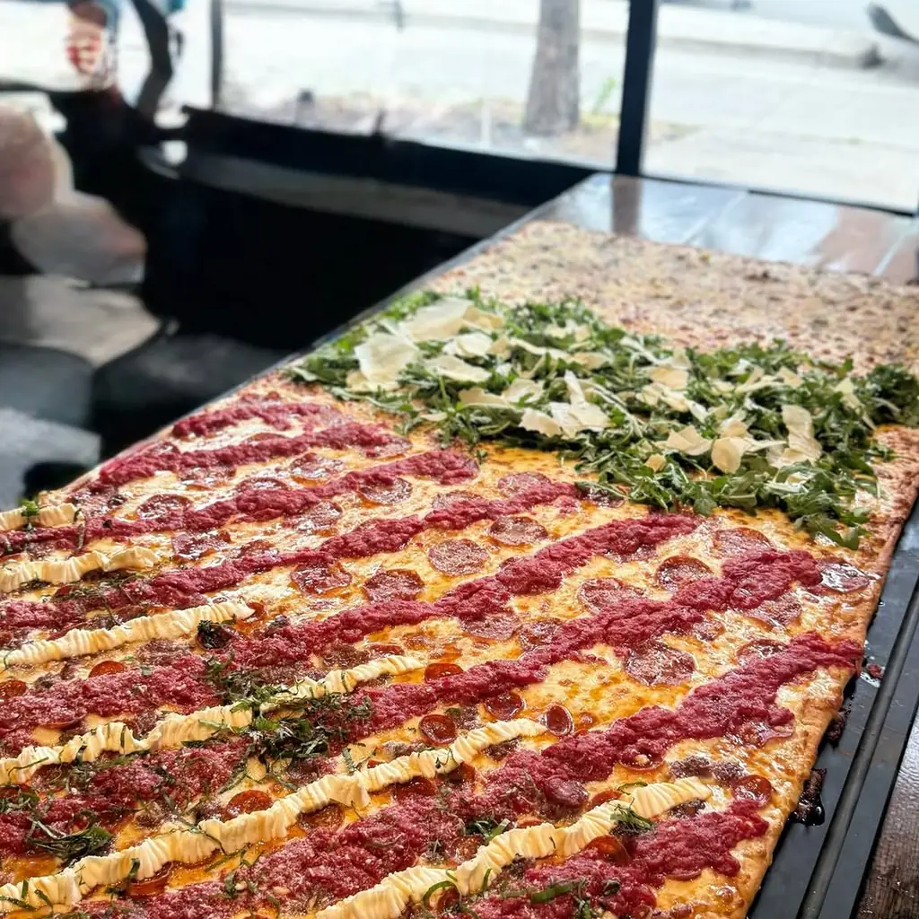 Paulie Gee's Logan Square, photo credited to @planes_and_plates on Instagram.