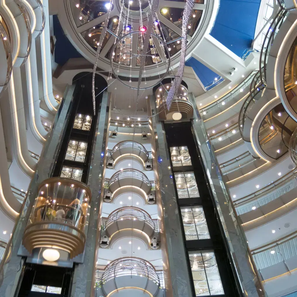 Multi-level cruise ship atrium with elevator banks