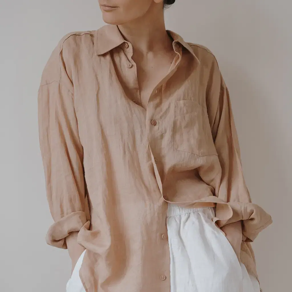 A loose shirt and trousers worn together