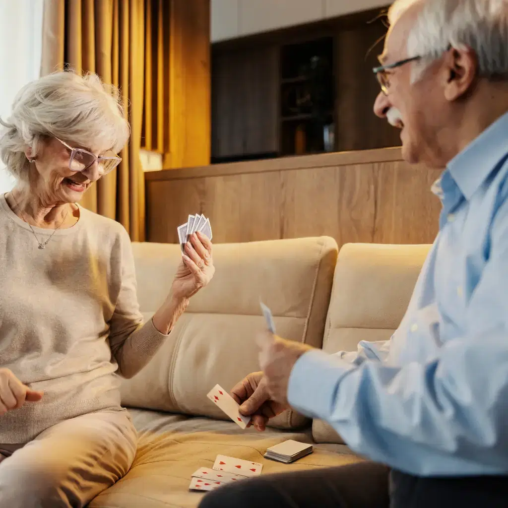 An older couple enjoying a card game