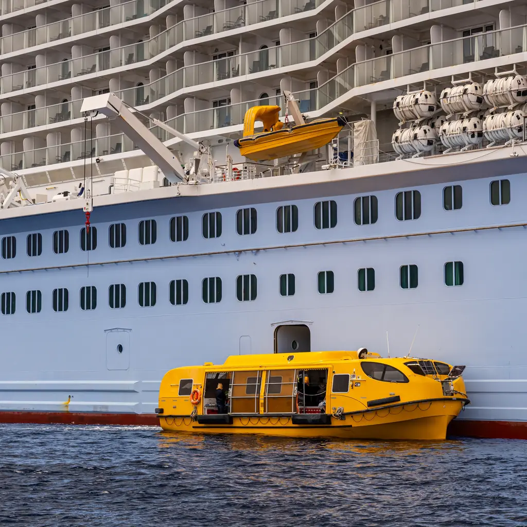 A tender boat alongside a cruise ship off Kona, Hawaii
