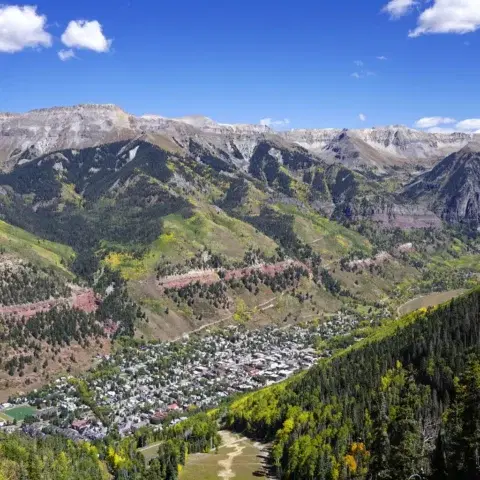 Telluride and its mountain valley viewed from the gondola route in Colorado.