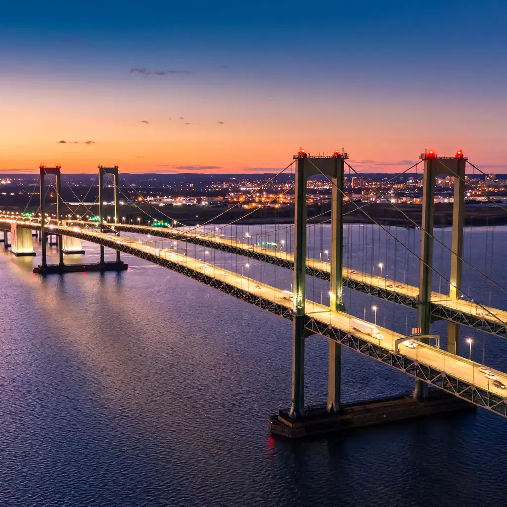 Delaware Memorial Bridge crosses the Delaware River between Delaware and New Jersey.