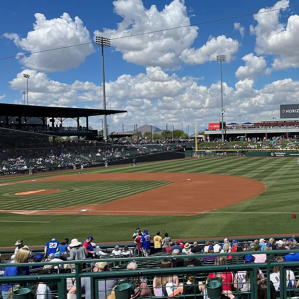 Fans filling the stands at a Cactus League spring training game in Mesa, Arizona