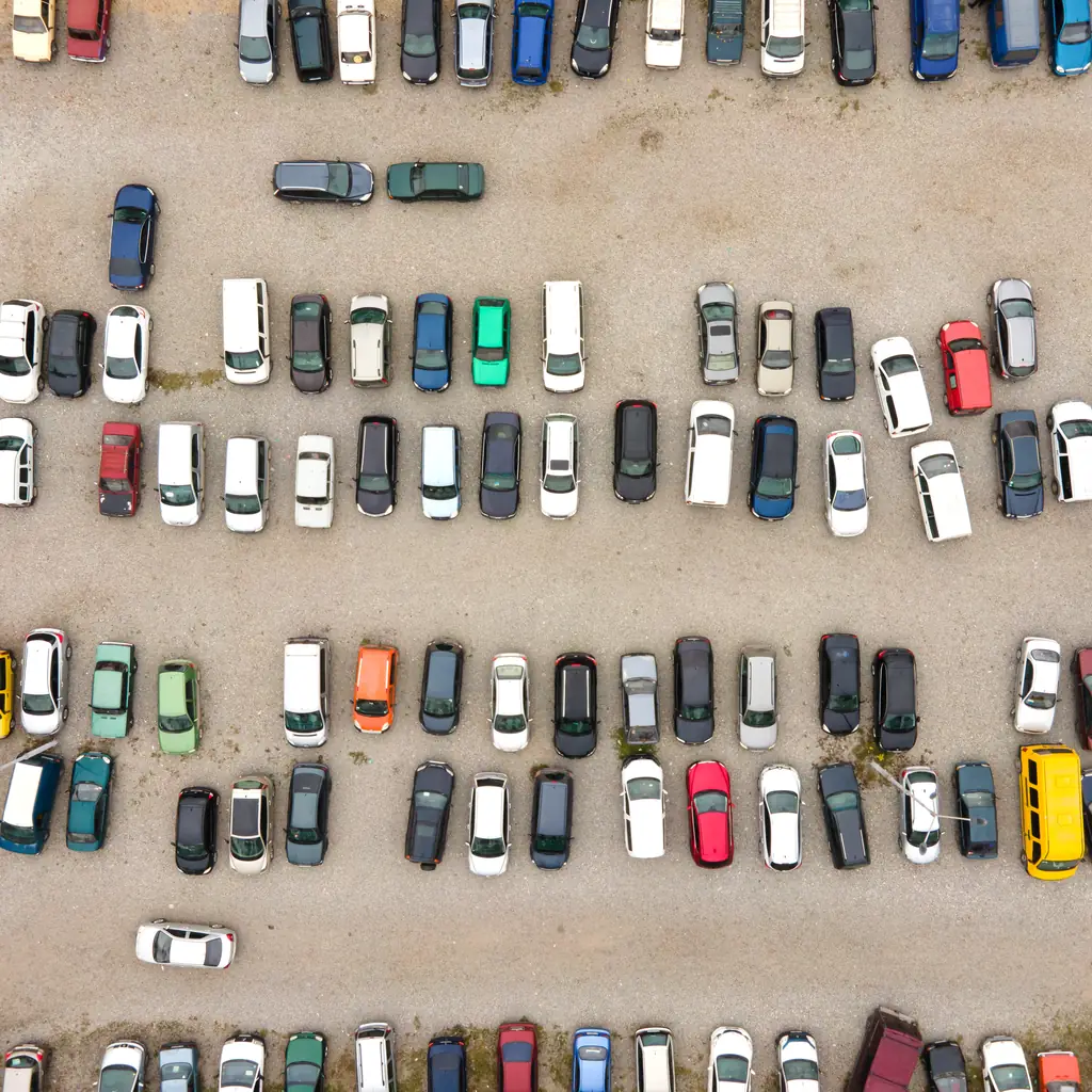 Heavy traffic on a multi-lane highway leading toward an airport