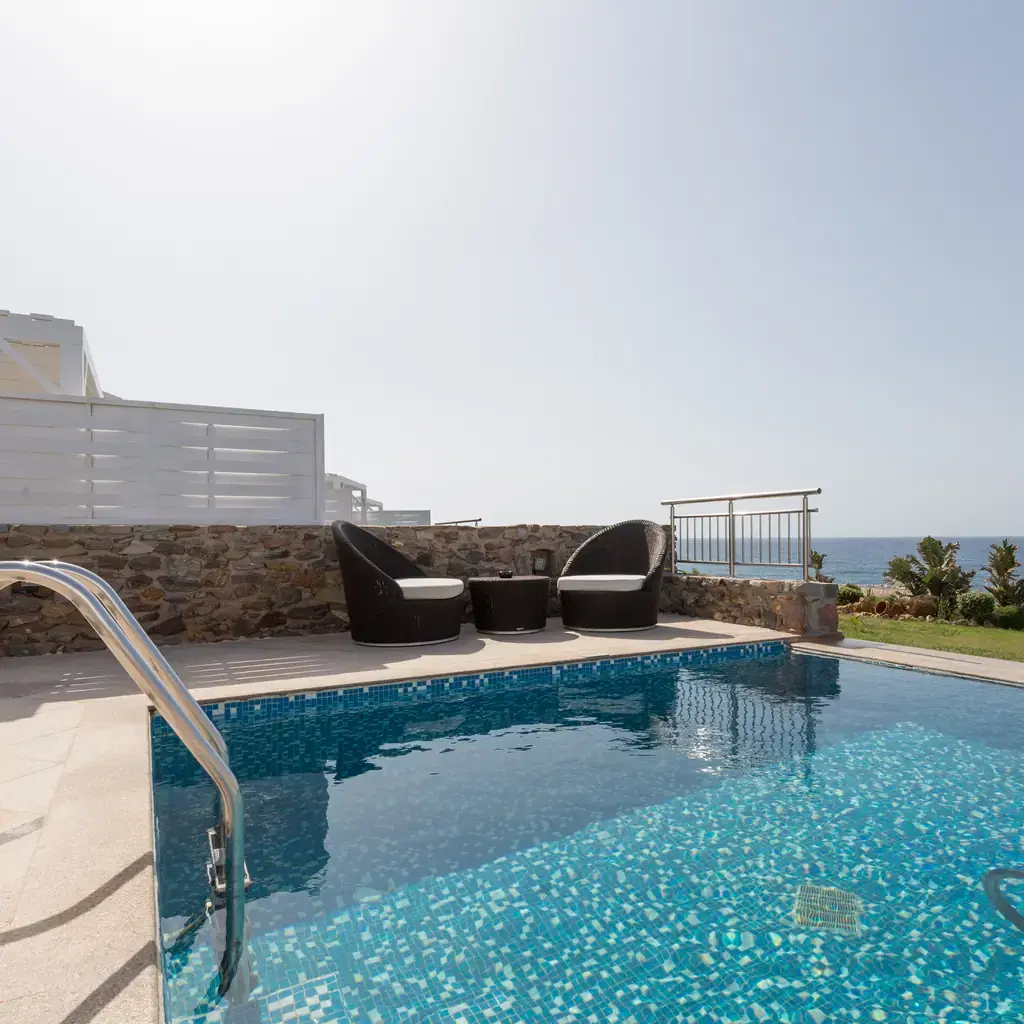 A private plunge pool on a suite terrace overlooking the ocean, illustrating a plunge-pool suite category.